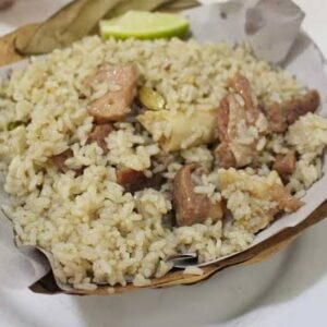 A serving of authentic Dhaka Kacchi Biryani featuring tender mutton and aromatic basmati rice, a staple of a TripGlider food tour in Bangladesh.