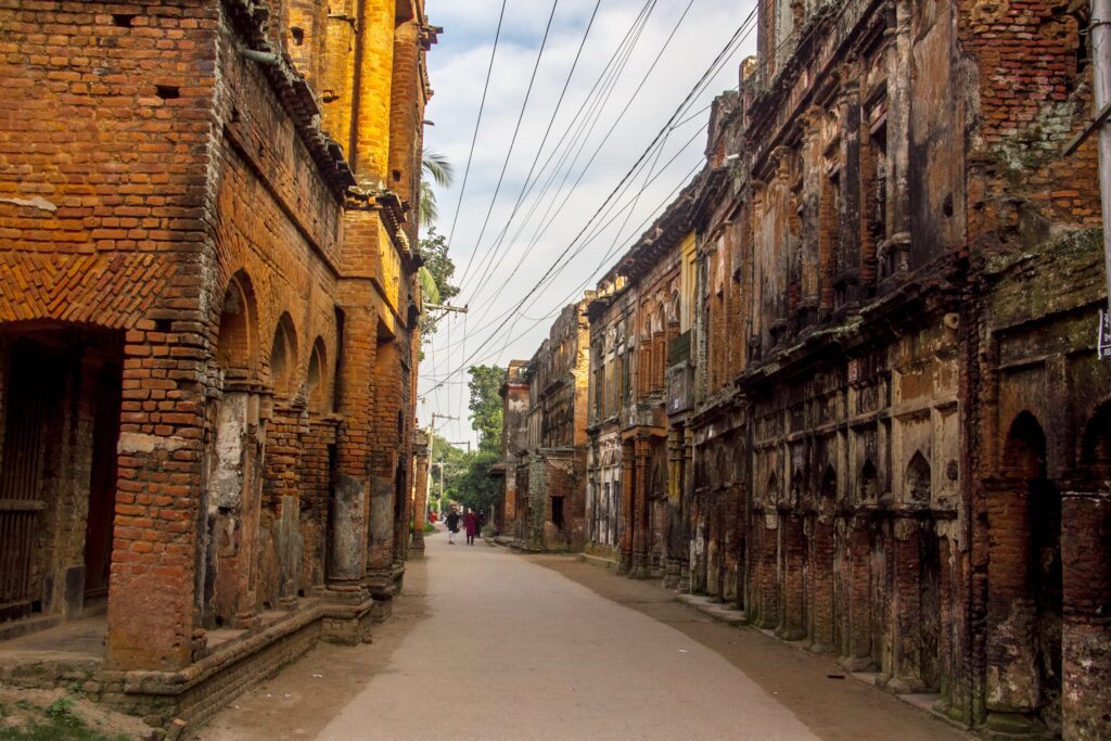 Abandoned 19th-century merchant mansions in Panam Nagar, Sonargaon, showcasing Indo-European architecture during a Trip Glider heritage tour.